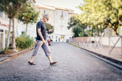 Full length of young man in city