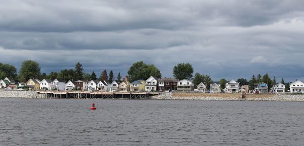 View of beach against cloudy sky