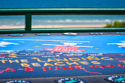 Text written on swimming pool in city