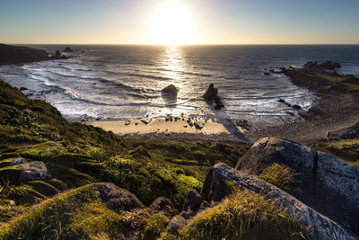 Scenic view of sea against sky during sunset