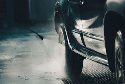 Close-up of car on street