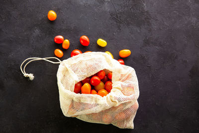 High angle view of orange fruits in basket