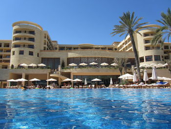 Swimming pool against clear sky