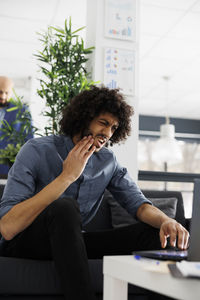 Business colleagues working at office