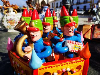 Close-up of toys on table at market