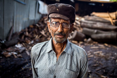 Portrait of man wearing eyeglasses