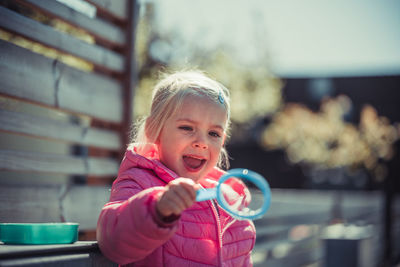 Portrait of a girl with bubbles