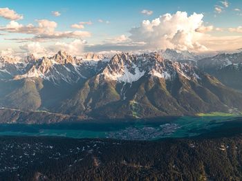 Scenic view of snowcapped mountains against sky