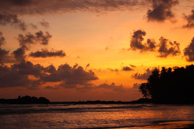 Scenic view of sea against sky during sunset