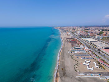 High angle view of sea against blue sky