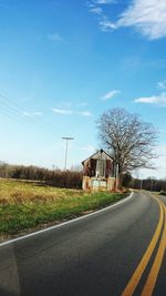 Road passing through field