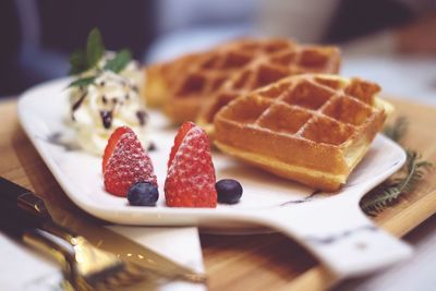 Close-up of food in plate on table