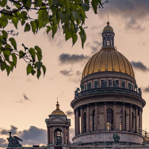 Low angle view of building against sky during sunset