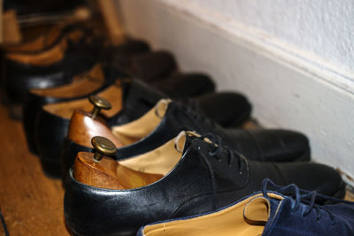 Close-up of footwear in row