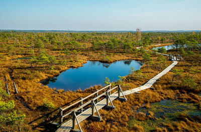 High angle view of bridge over lake against sky