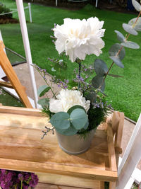 High angle view of white flower pot on table