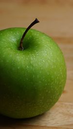 Close-up of granny smith apples against white background