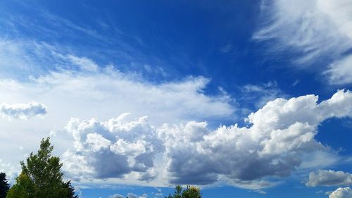 Low angle view of clouds in blue sky