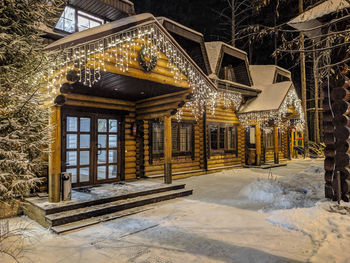 Illuminated building during winter at night