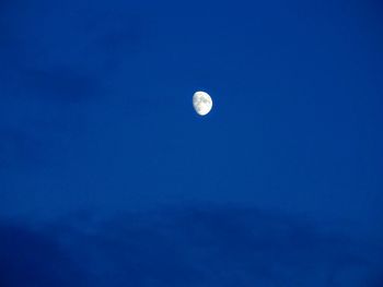 Low angle view of moon in sky