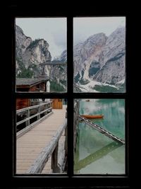 Scenic view of snowcapped mountains seen through window