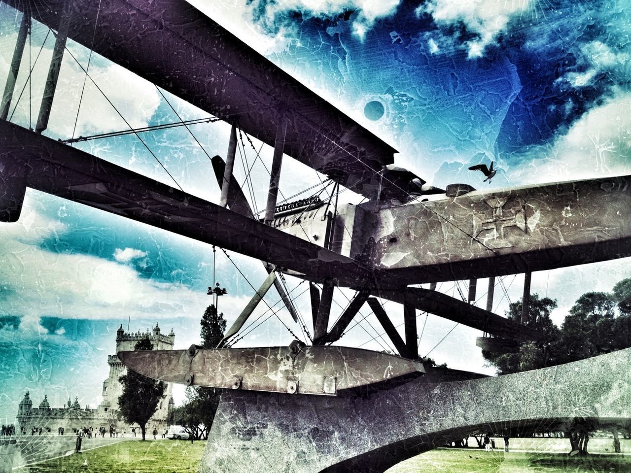 built structure, architecture, sky, cloud - sky, building exterior, cloud, low angle view, day, water, abandoned, sunlight, old, cloudy, outdoors, bridge - man made structure, tree, damaged, blue, transportation, no people