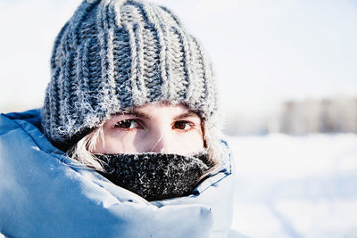 Portrait of woman in snow