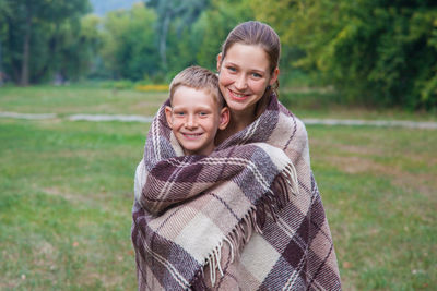 Portrait of happy mother and son