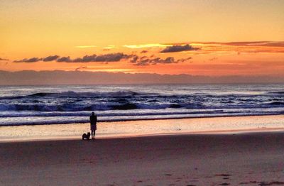 Scenic view of sea at sunset
