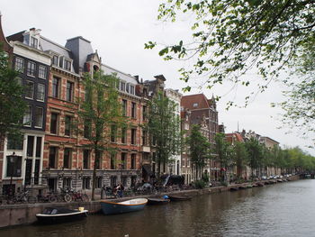Canal passing through city buildings