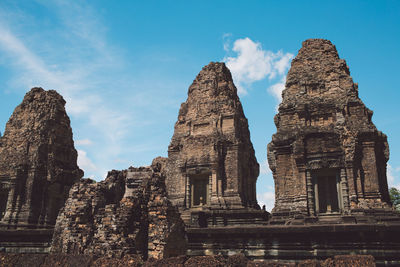 Old temple building against sky