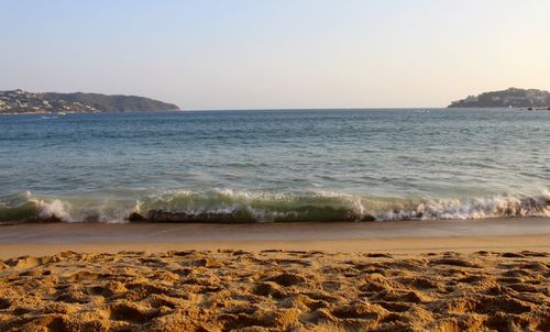 Scenic view of sea against clear sky