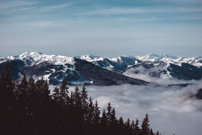 Scenic view of snowcapped mountains against sky