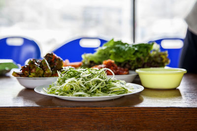 Close-up of food in plate on table