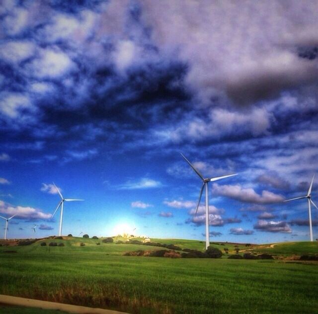 wind power, wind turbine, alternative energy, windmill, environmental conservation, fuel and power generation, renewable energy, field, landscape, technology, sky, rural scene, cloud - sky, traditional windmill, cloudy, tranquil scene, nature, electricity, tranquility, grass