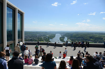 Group of people looking at city buildings