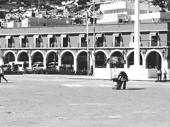 People in front of building