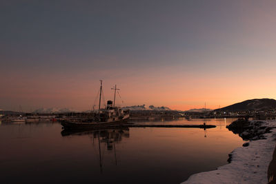 Old ship at sunset