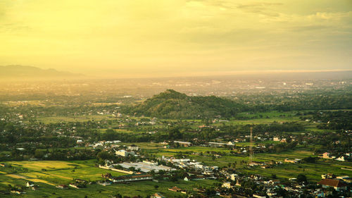 High angle view of townscape against sky during sunset