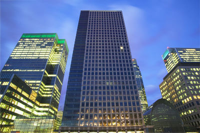 Low angle view of modern buildings against sky
