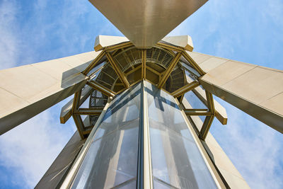 Low angle view of metallic structure against sky