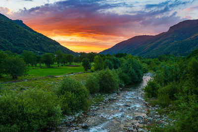 Scenic view of landscape against sky during sunset