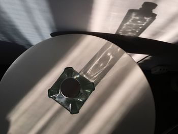 High angle view of bottle on table at home