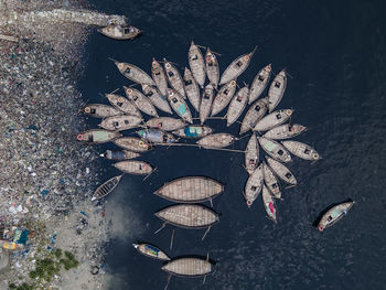 Aerial view of wooden passenger boats along the buriganga river, keraniganj, dhaka, bangladesh