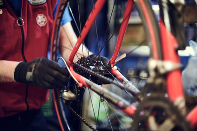 Man repairing bicycle