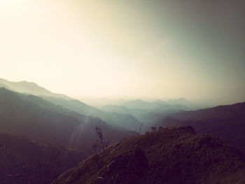 Scenic view of mountains against sky during winter