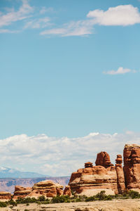 Layers of red sandstone under a sunny sky in the canyonlands utah