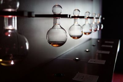 Liquid in flask hanging at laboratory