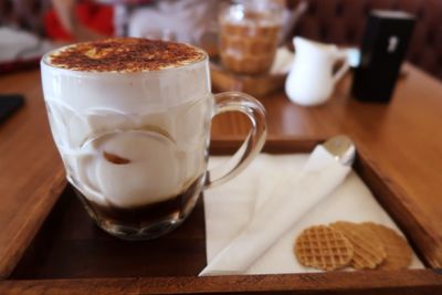 Close-up of coffee cup on table