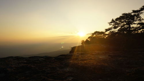 Scenic view of mountains against sky during sunset